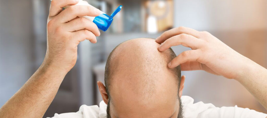 Spraying-Saline-After-Having-a-Hair-Transplant